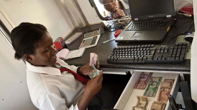 Microbank services inside Banco de Moçambique's mobile bank in Inchope.